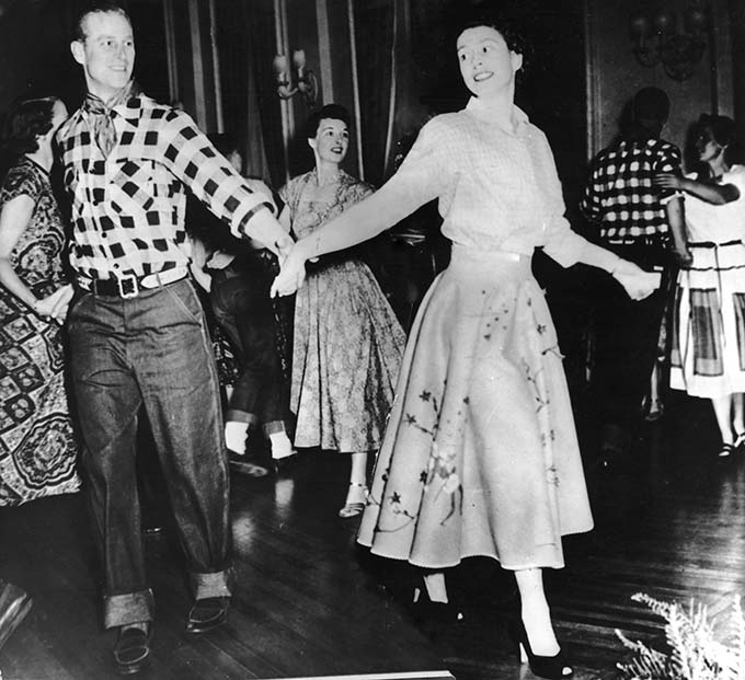 Queen Elizabeth II (then Princess Elizabeth) dances with her husband, the Duke of Edinburgh, at a square dance held in their honour in Ottawa, by Governor General Viscount Alexander, 17th October 1951. The dance was one of the events arranged during their Canadian tour. (Photo by Keystone/Hulton Archive/Getty Images)